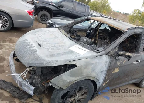 2015 Hyundai Santa Fe Sport 2.4L z USA, uszkodzony, nr VIN 5XYZUDLBXFG298902